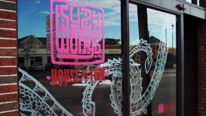 Store window logo design for Suzy Wongs House of Yum restaurant in Nashville, Tennessee