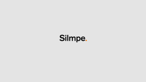 Silmpe. still frame from Brentwood, TN based RANDA Tower tradeshow looping video designed and animated by Nashville's ST8MNT employing orange and black akzidenz grotesque typography and the Cambridge University Scramble Type Effect