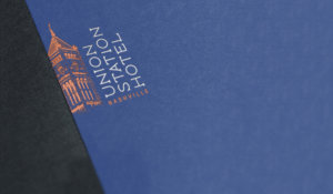 Union Station Hotel clock tower logo print example on blue paper.