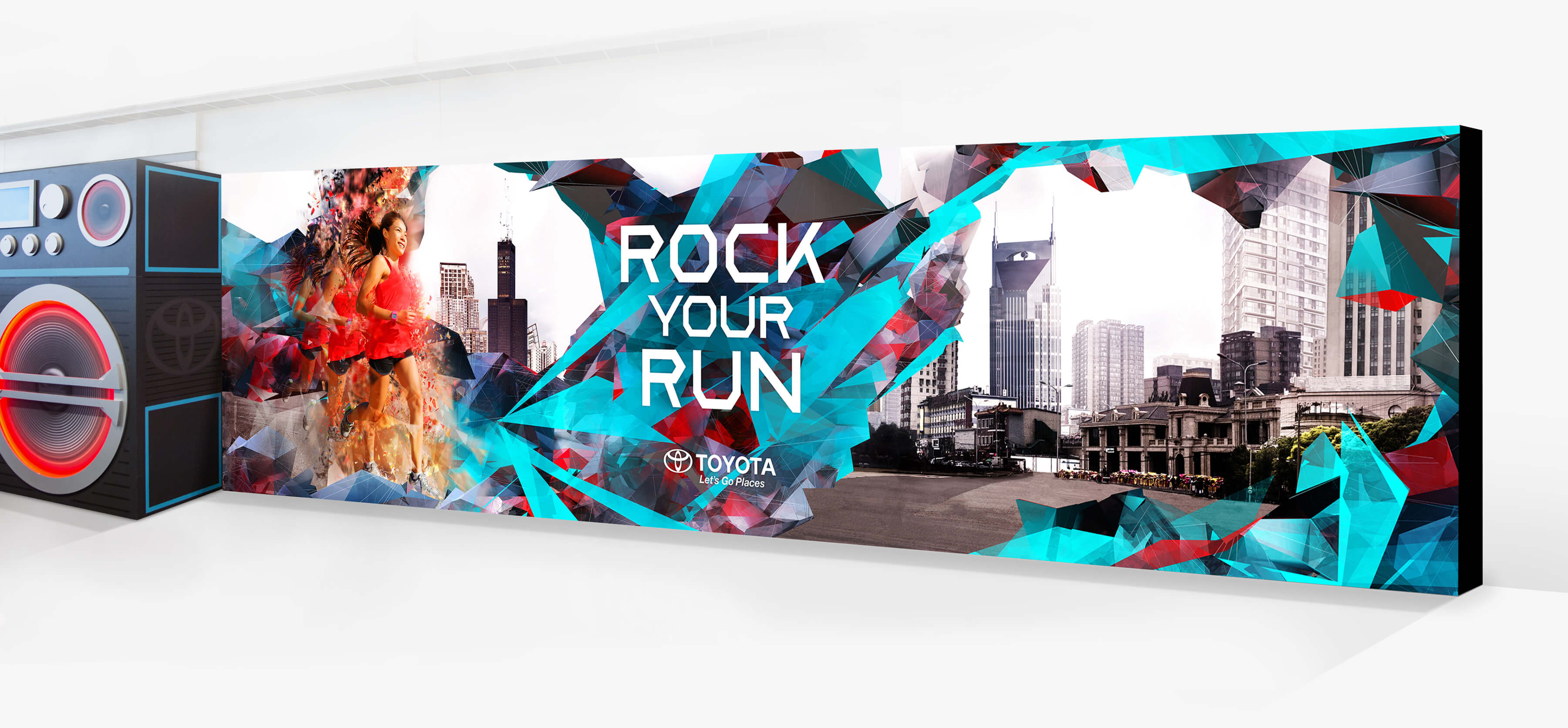 Toyota Rock Your Run back wall right panel featuring the Rock Your Run logo a city scape, the Chicago Willis Tower, the Nashville AT&T Batman Buildling, dynamic geometric fragments, male runner, and the boombox.