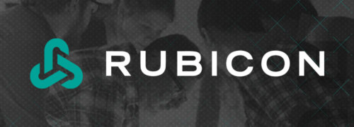 rubicon logo on dark treated background image of a group working together