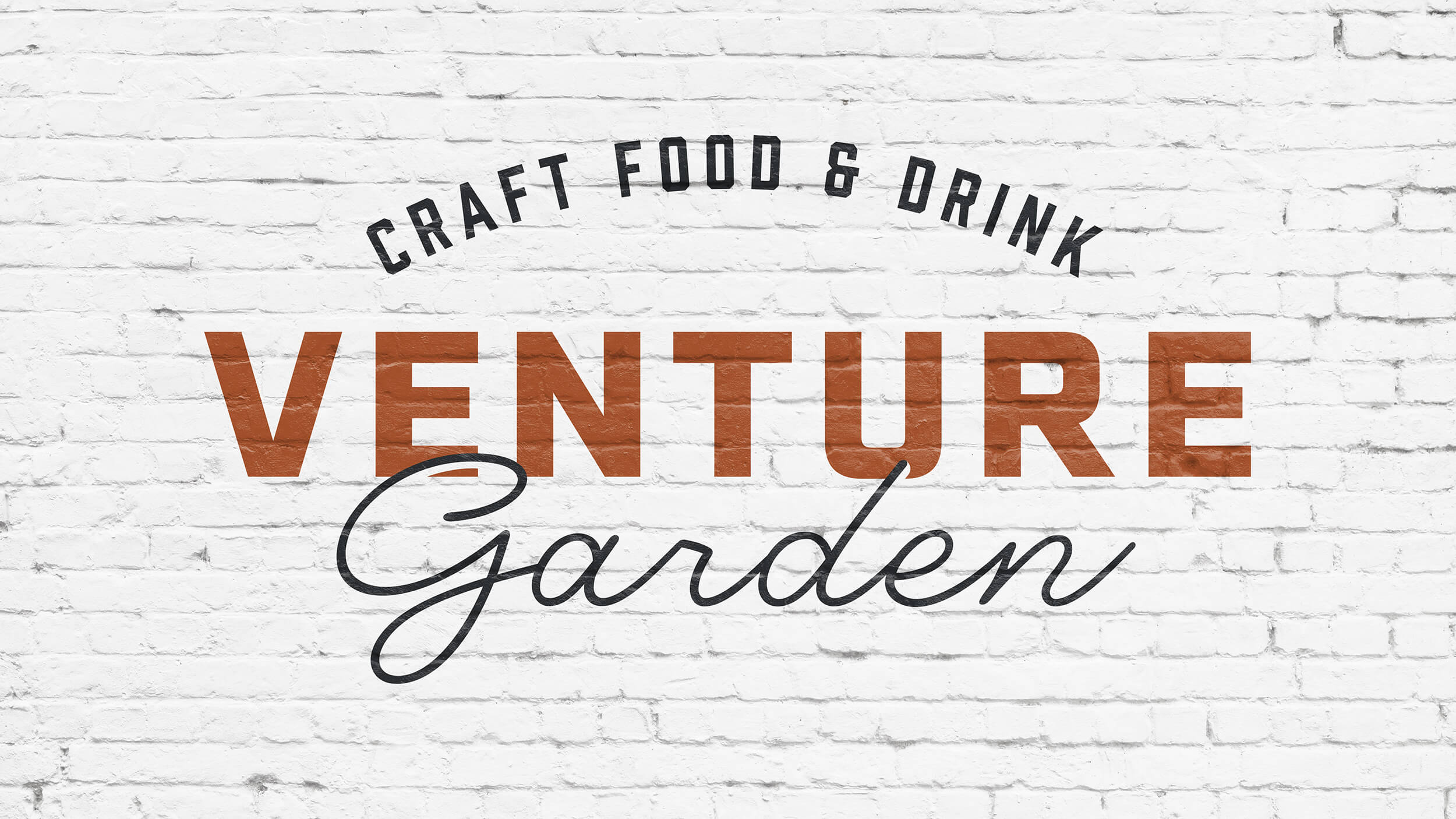 Venture Garden typography lockup with craft food & drink tagline on brick wall
