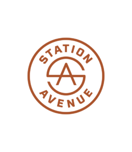 Station Avenue circular logo crest in rust color