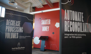 Wall graphics and pop up banners with cash management graphics and brand messaging for RCS