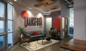 RCS headquarters lobby with Transform Cash Management mural
