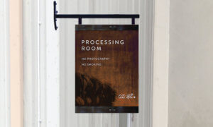 OZ Tyler wayfinding weathered metal sign with oak barrel imagery that says Processing Room