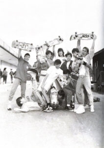 Teenagers at Mosley High School holding skateboards in 1988