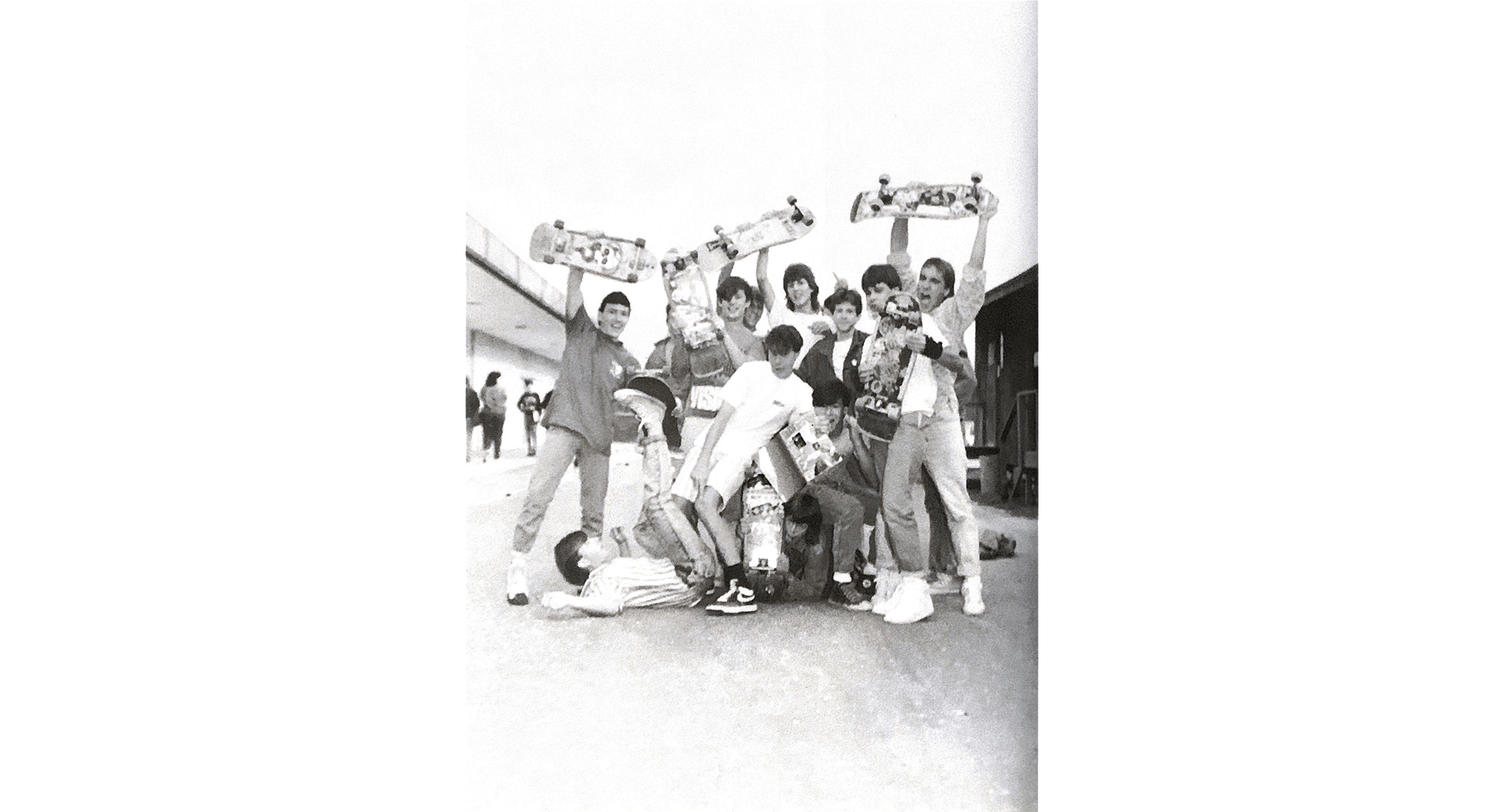Teenagers at Mosley High School holding skateboards in 1988