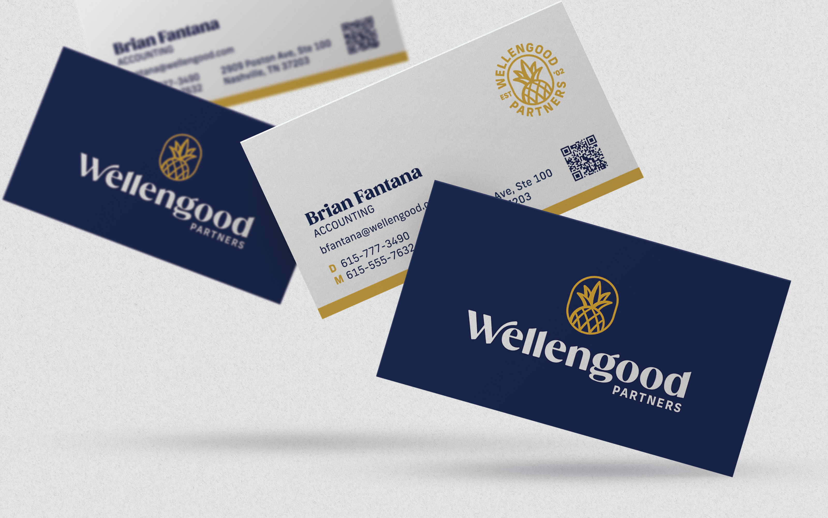 wellengood business cards on light background