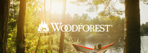 Image of couple in hammock on lake with Woodforest logo