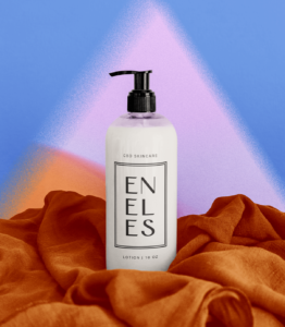 CBD skincare Lotion bottle mockup with "CBD SKINCARE, LOTION 10 OZ" and the Eneles rectangle badge. Bottle sits on a orange cloth with gradient triangle background behind it