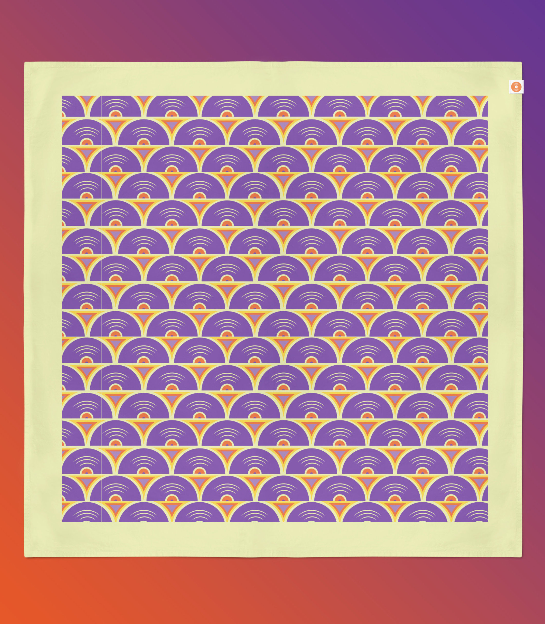 A square bandana with a pattern made up of lines of purple records and a melon colored border around the outside of the bandana.