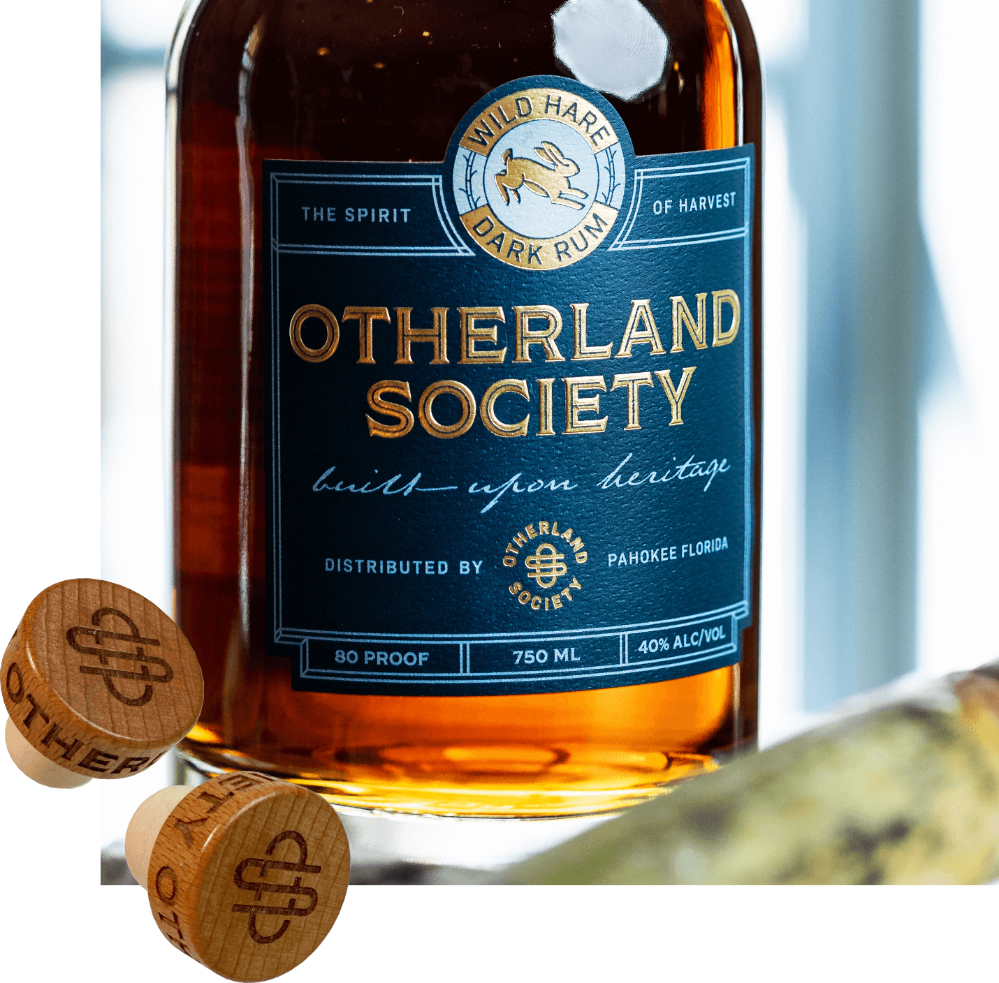 Otherland Society rum bottle packaging detail shot with engrave bottle caps