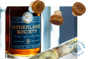 Otherland Society rum bottle packaging detail shot with engrave bottle caps and monogram logo
