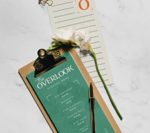 Mockup of example cocktail menu on clipboard