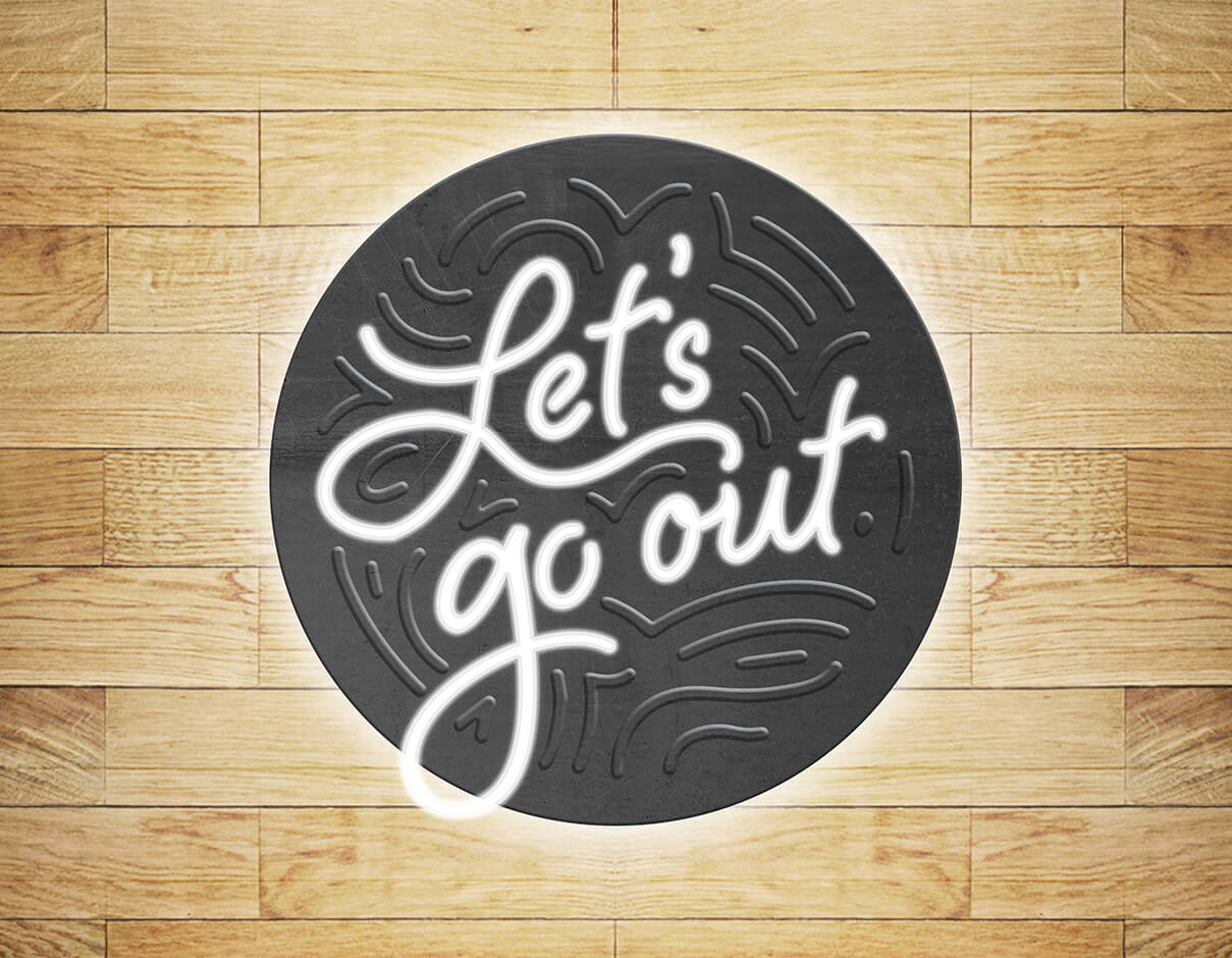 Let's go out neon and metal signage on wood background