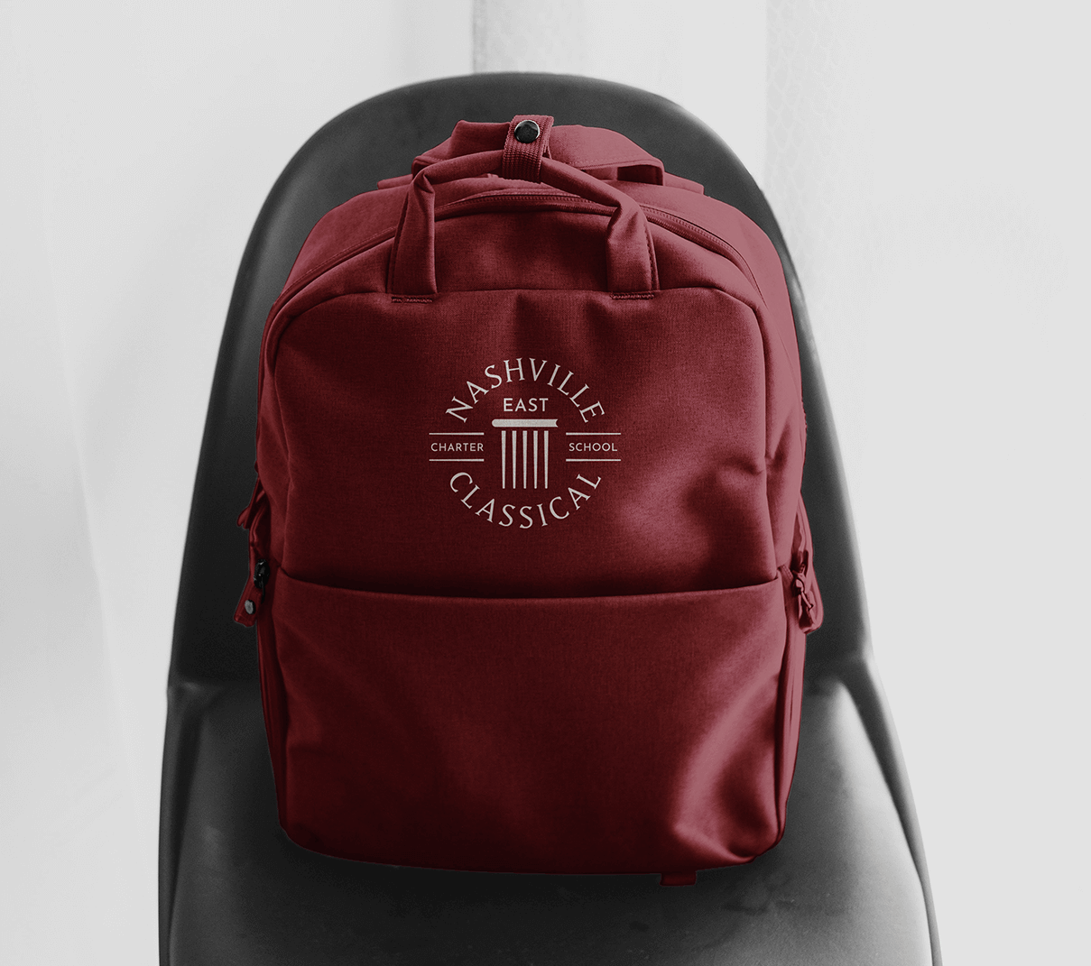 Nashville Classical Charter School rebrand application on backpack designed by ST8MNT
