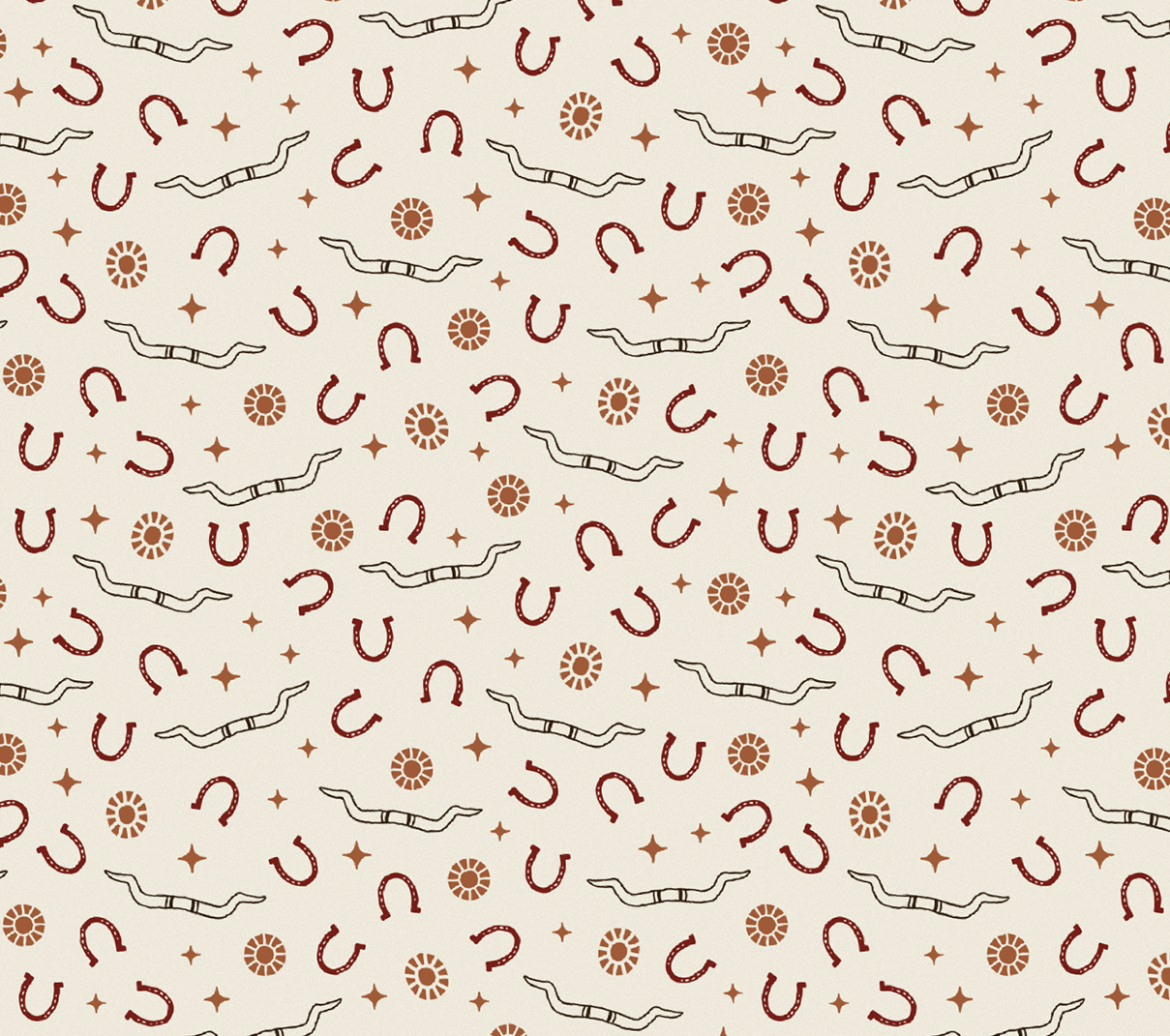 A pattern of horseshoes, gems, stars, and longhorns sits on a cream background