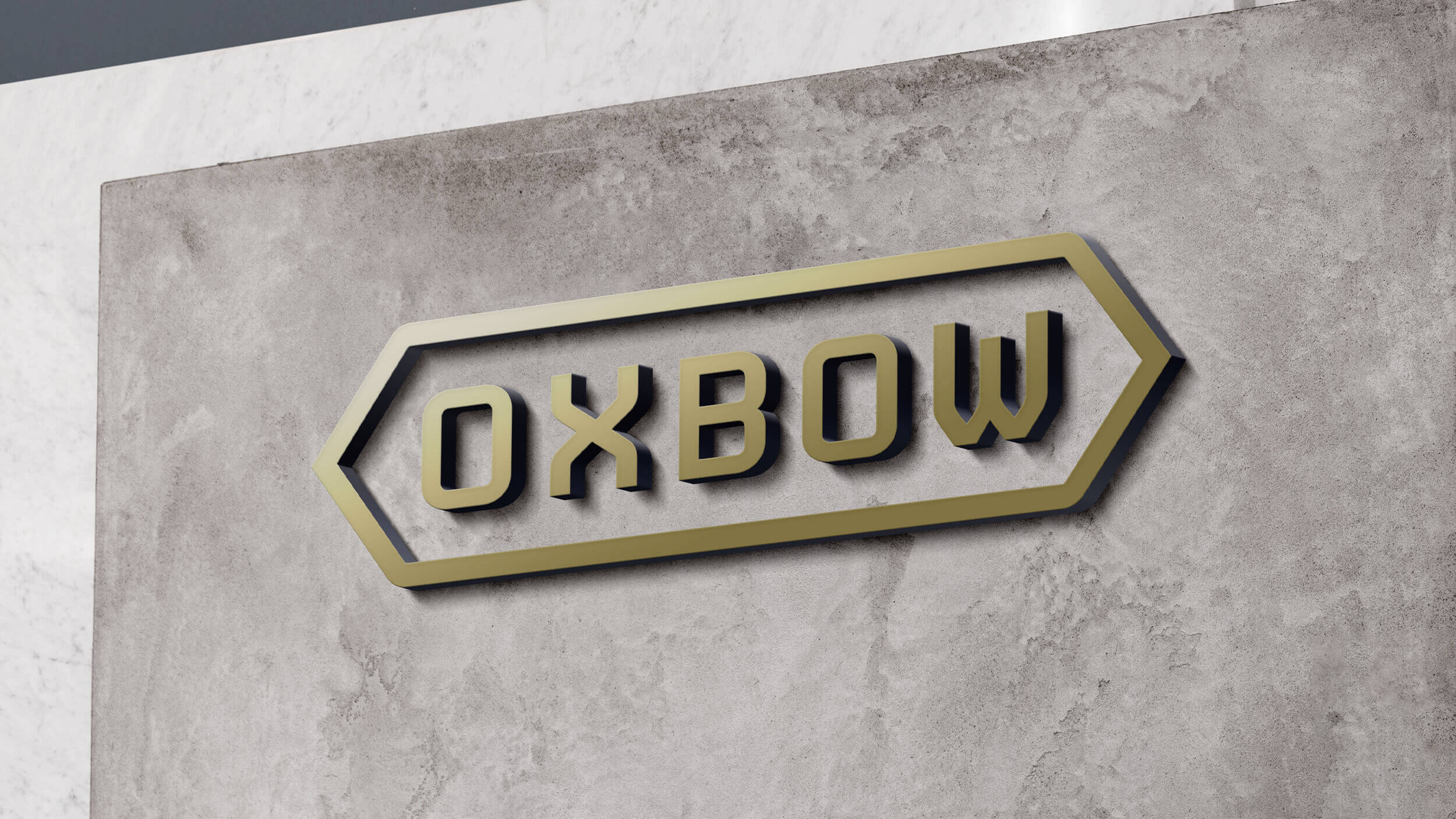 gold Oxbow logo sign on concrete background