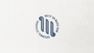 Motif on Music Row boutique hotel brand logo crest with brand name and Nashville, Tennessee identifier text wrapping around the logo mark