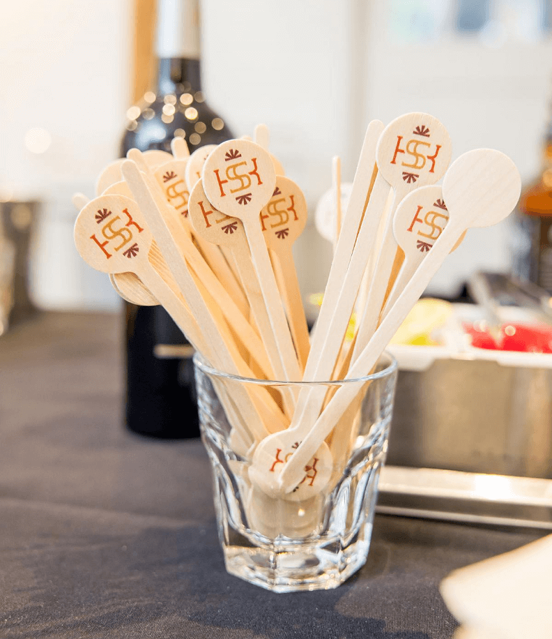 Image of branded drink stirrers from the name reveal event