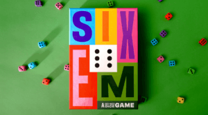 SIXEM Board Game Cover design that reads "A Fast-Paced Dice Game" that sits on a green background with dice scattered around the box