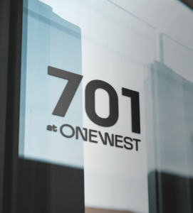 Mockup of office building number utilizing identity developed for One West at Corporate Center in Raleigh, NC as part of ST8MNT branding project