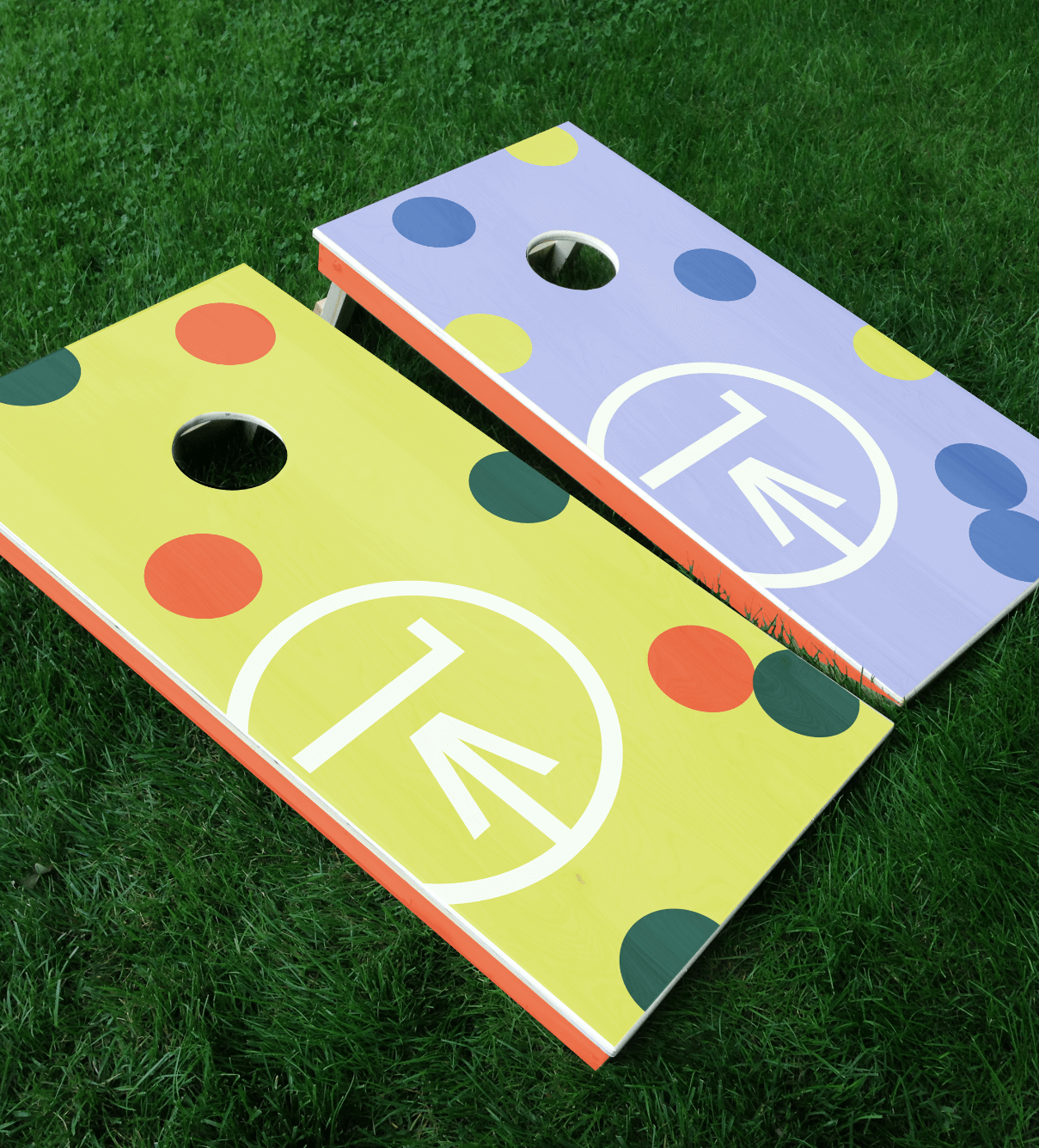 One West branded cornhole boards utilizing brand assets established by ST8MNT in identity project