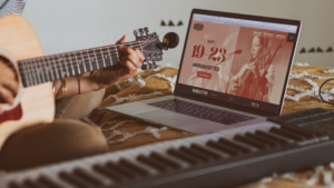 Americana Music Association homepage design displayed on a musician's laptop