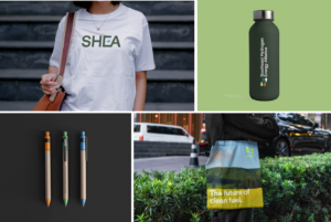 example of SHEA swag— a t shirt, stainless steel water bottle, eco friendly pens, and a tote bag