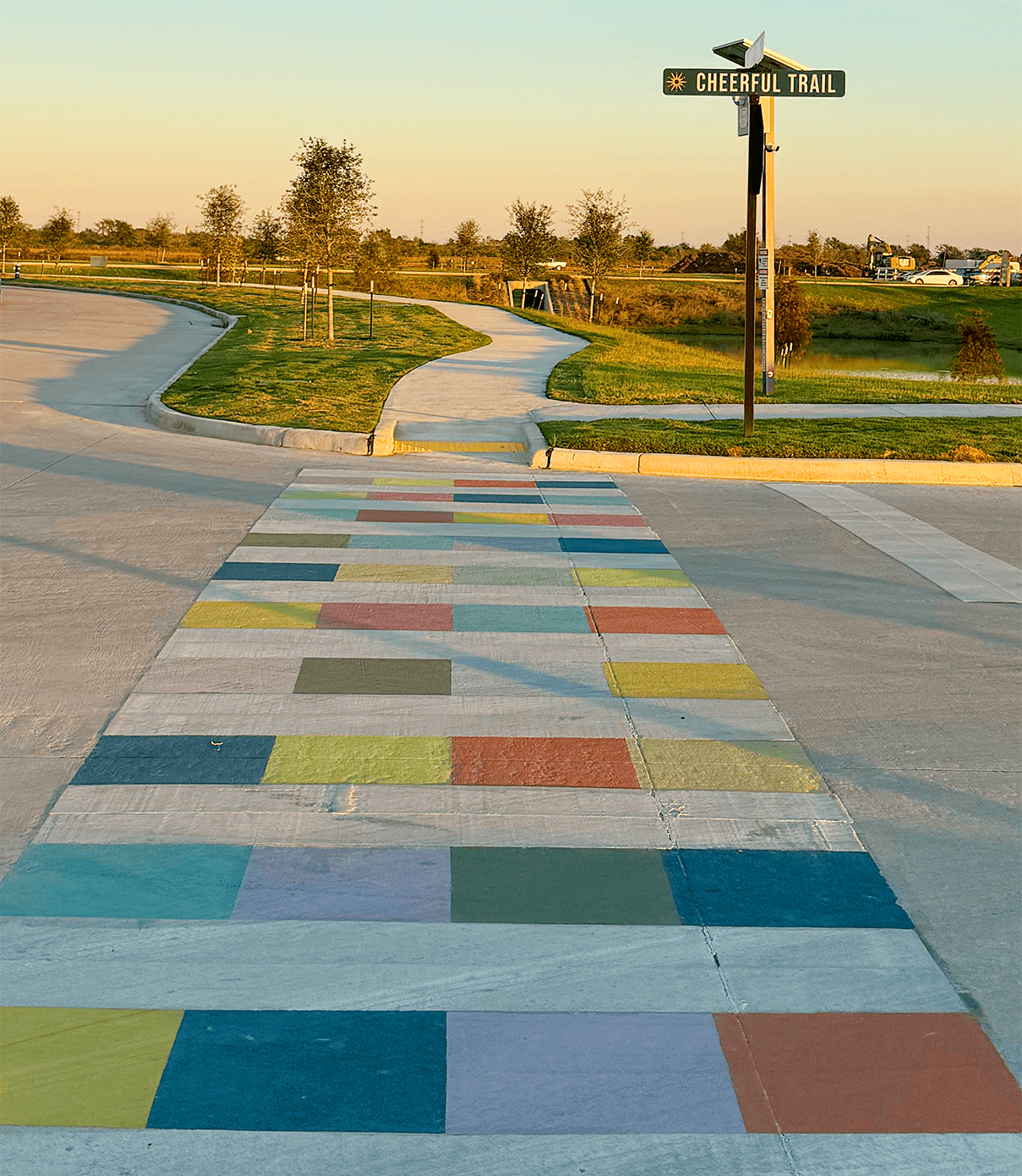 Jubilee crosswalk art created by ST8MNT as part of environmental signage for master-planned community in Texas