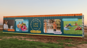 Shipping container design featuring the Joyhub amenities, designed by ST8MNT for master-planned community Jubilee