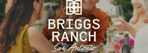 Briggs Ranch San Antonio logo lockup on lifestyle imagery of friends enjoying dinner