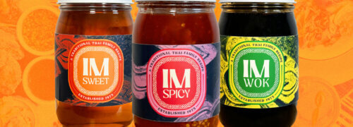 Product packaging design for IM Sweet, IM Spicy and IM Wok sauces on an orange background for International Market in Nashville, TN