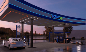 Rendering of PowerUp station at dusk with logo featured prominently